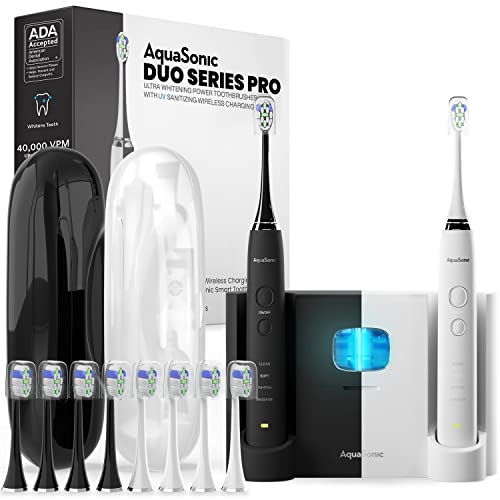 AquaSonic DUO PRO – Ultra Whitening 40,000 VPM Electric ToothBrushes – ADA Accepted - 4 Modes with Smart Timers - UV Sanitizing & Wireless Charging Base - 10 ProFlex Brush Heads & 2 Travel Cases