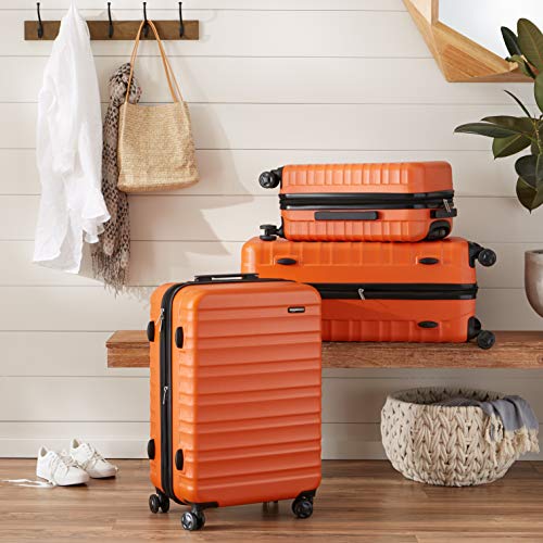 Amazon Basics Expandable Hardside Carry-On Luggage, Suitcase with Wheels, 21-Inch Spinner with Four Spinner Wheels and Scratch-Resistant Surface, Orange