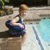 Poolmaster Learn-to-Swim Vest, Adjustable Tube Floatation Swim Trainer and Swim Aid for Kids Ages 3 to 6 Years, Blue