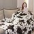 KIVEE Cute Cow Print Blanket: Cozy Travel Companion